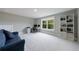 Spacious bedroom with lots of room, natural light, and a built in bookcase at 130 Lapis Lake Pt, Fayetteville, GA 30215