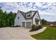 Spacious home with attached two-car garage and large driveway at 130 Lapis Lake Pt, Fayetteville, GA 30215