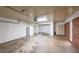 Spacious garage features lots of storage space and an access door to outside at 213 Linda Dr, Tucker, GA 30084
