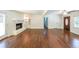 Spacious living area features hardwood floors, fireplace and natural light at 213 Linda Dr, Tucker, GA 30084