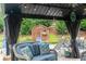 Gazebo with comfortable seating, backyard shed, and adjacent patio offers a tranquil outdoor living space at 2256 Long Bow Chase Nw, Kennesaw, GA 30144