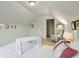 Light-filled bedroom showcases neutral carpeting and tranquil green walls at 3491 Amerigo Dr, Buford, GA 30519