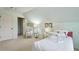 Bedroom with light green walls, white trim, and neutral carpeting at 3491 Amerigo Dr, Buford, GA 30519