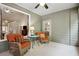 Relaxing sunroom with comfortable chairs and views of the surrounding landscape at 3491 Amerigo Dr, Buford, GA 30519