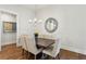 Elegant dining room features modern chandelier, neutral decor, and hardwood flooring at 400 Southland Cir, Canton, GA 30115