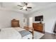 Comfortable main bedroom features hardwood floors, soft bedding and dual dressers at 400 Southland Cir, Canton, GA 30115
