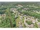 Scenic aerial view of a residential community nestled among lush green trees at 602 Davenport Pl, Canton, GA 30115