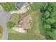 Aerial view of a home with a lush backyard, patio, and inviting outdoor space at 602 Davenport Pl, Canton, GA 30115
