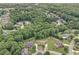 Scenic aerial view of a residential community nestled among lush green trees at 602 Davenport Pl, Canton, GA 30115