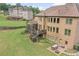 Spacious backyard with a screened porch, deck, patio, and lush lawn, perfect for outdoor entertaining at 602 Davenport Pl, Canton, GA 30115