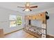 Bright bedroom features a built-in bunk bed and natural light from the window at 602 Davenport Pl, Canton, GA 30115