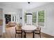 Charming breakfast nook with large windows, stylish lighting and wood floors at 602 Davenport Pl, Canton, GA 30115