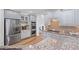 Modern kitchen with granite countertops, stainless steel appliances, and ample cabinet space at 602 Davenport Pl, Canton, GA 30115