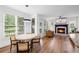 Inviting living room featuring a cozy fireplace and abundant natural light at 602 Davenport Pl, Canton, GA 30115