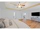 Spacious main bedroom with a trey ceiling, walk-in closet, and an en-suite bathroom at 602 Davenport Pl, Canton, GA 30115