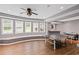 Spacious recreation room featuring a ping pong table and large windows at 602 Davenport Pl, Canton, GA 30115