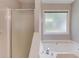 Bathroom showcasing a soaking tub and shower at 1980 Mcconnell Rd, Grayson, GA 30017