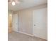 Bedroom featuring a white door, neutral paint, and light-colored carpet at 1980 Mcconnell Rd, Grayson, GA 30017