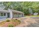Charming home with a large two car garage, spacious driveway, and well-maintained yard at 1980 Mcconnell Rd, Grayson, GA 30017