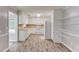 The kitchen area features an adjoining dining area with stainless steel appliances at 1980 Mcconnell Rd, Grayson, GA 30017