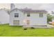 Backyard view of house with white siding at 2341 Alden, Jonesboro, GA 30236