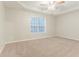 Bedroom featuring neutral walls, carpet, and a window for natural light at 2341 Alden, Jonesboro, GA 30236