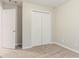 Bedroom with closet featuring neutral walls and soft carpet flooring at 2341 Alden, Jonesboro, GA 30236