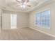Bedroom with ceiling fan, neutral walls, carpet flooring, and a window at 2341 Alden, Jonesboro, GA 30236