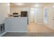 An eat-in kitchen featuring white cabinets, black appliances, and tile flooring at 2341 Alden, Jonesboro, GA 30236