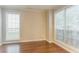 Bright room with gleaming hardwood floors and large windows providing natural light at 2341 Alden, Jonesboro, GA 30236