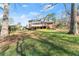 Expansive backyard featuring a deck and screened porch, perfect for outdoor enjoyment and entertaining at 4076 Shady Nw Cir, Lilburn, GA 30047