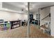 Finished basement with carpeted flooring, ceiling fan, support beam, and storage at 4076 Shady Nw Cir, Lilburn, GA 30047