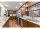 Updated kitchen with granite counters, stainless appliances, and eat-in area at 4076 Shady Nw Cir, Lilburn, GA 30047