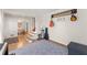 Elegant room with hardwood floors, musical decor, leading into the dining area at 4076 Shady Nw Cir, Lilburn, GA 30047