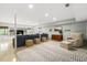Spacious finished basement featuring a comfortable seating area and built-in shelving at 4343 Sprucebough Dr, Marietta, GA 30062