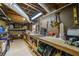Unfinished basement with shelving units and work bench. Good storage space at 4343 Sprucebough Dr, Marietta, GA 30062