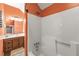 Bathroom featuring a tub and shower combination with a vanity and mirror at 4343 Sprucebough Dr, Marietta, GA 30062