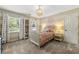 Bright bedroom with a chandelier, large windows, and pink accents creates a charming and inviting space at 4343 Sprucebough Dr, Marietta, GA 30062