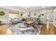 Comfortable living room with decorative trim, neutral sofas, decorative pillows, and an area rug at 4343 Sprucebough Dr, Marietta, GA 30062