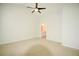 Spacious bedroom featuring neutral carpet, a ceiling fan and ample space for relaxation at 179 Camry Ln, Grayson, GA 30017