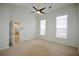 Inviting bedroom with plush carpet, a ceiling fan, and plenty of natural light at 179 Camry Ln, Grayson, GA 30017