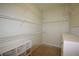 Walk-in closet featuring wire shelving and ample vertical storage space for organization at 179 Camry Ln, Grayson, GA 30017