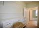 Organized walk-in closet with built in shelving, drawers and ample storage space at 179 Camry Ln, Grayson, GA 30017