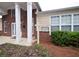 Community center exterior with brick accents, white columns, large windows, and a manicured lawn at 179 Camry Ln, Grayson, GA 30017