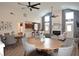 Spacious living area with a fireplace, high ceilings, modern decor, and ample seating at 179 Camry Ln, Grayson, GA 30017