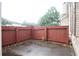 Patio with a privacy fence and view of the home's exterior at 179 Camry Ln, Grayson, GA 30017