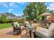 Spacious back deck perfect for entertaining, with patio furniture and a grill at 2535 Winthrope Way, Lawrenceville, GA 30044
