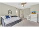 Neutral bedroom with daybed, chest of drawers, and en suite bathroom at 2535 Winthrope Way, Lawrenceville, GA 30044