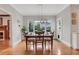 Dining room featuring a wooden table set with a view to the backyard at 2535 Winthrope Way, Lawrenceville, GA 30044