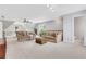 Spacious living room featuring neutral walls, sofas, and a pool table at 2535 Winthrope Way, Lawrenceville, GA 30044